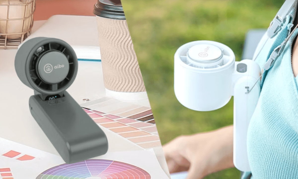 aibo 手持電風扇,一台桌立在辦公桌上,另一台扣掛於胸前肩帶